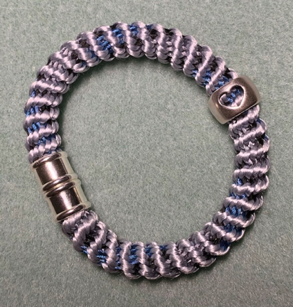 Kumihimo 16 strand bracelet
w/sterling silver heart slider